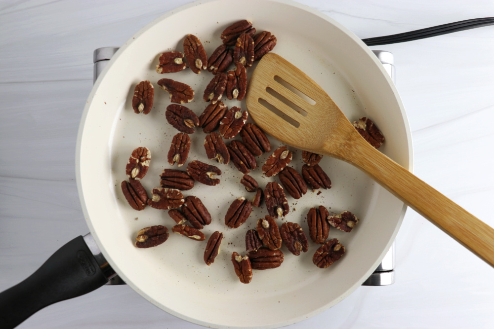 toasted pecans in skillet